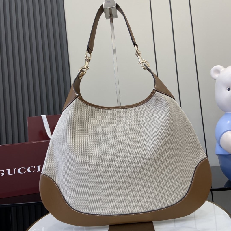 G*u*i top handle bags